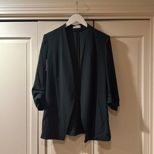 Emerald green blazer from aritzia. New with tags, size 6, never worn.